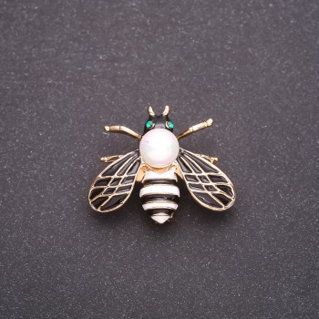 Butterfly Brooch with White and Black Enamel on Yellow Metal