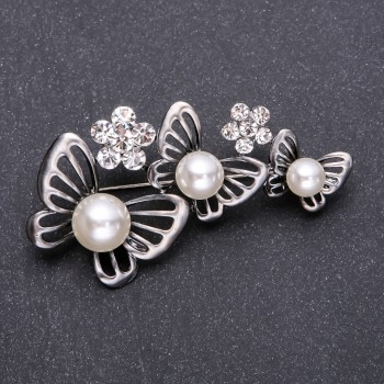 Brooch: Butterfly garland with white beads, 65x32 mm metal