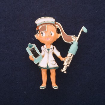 Brooch 'Doctor' enamel white and blue, 45x35mm, gold-tone metal