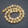 Beads on a cord natural stone rutilated quartz, hair-like smooth beads, diameter 10mm, length 39cm