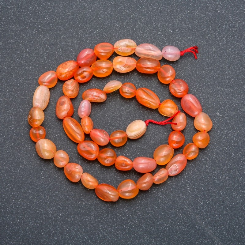 Carnelian beads on thread, faceted, 9x7 mm, length 41 cm +