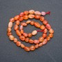 Carnelian beads on thread, faceted, 9x7 mm, length 41 cm +