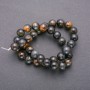 Beads of natural Tiger's Eye stone - smooth spheres, diameter 10 mm (+/-), on a thread, length 38 cm (+/-)