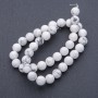 Howlite natural stone beads on a cord, round, 10mm diameter, 39 cm length