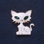 Brooch 'Kitty' white enamel gold-tone metal 3.5 x 3 cm