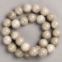 Beads on thread Gray-toned Quartz (synthetic acrylic) smooth round beads, 14mm diameter, length approximately 40 cm