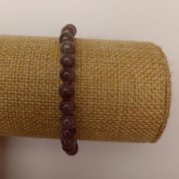 Elastic bracelet with tinted quartz (synthetic acrylic), dark gray smooth beads, 6.5 mm diameter, 18 cm length