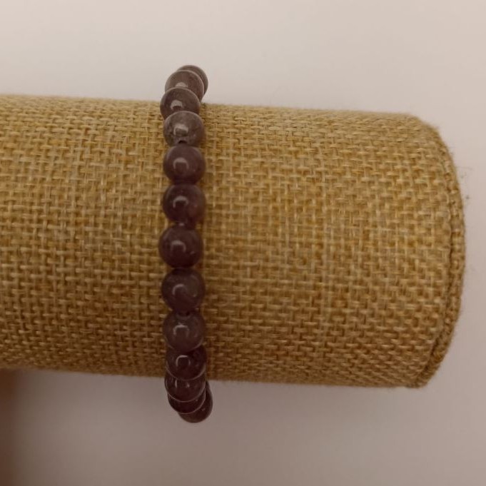 Elastic bracelet with tinted quartz (synthetic acrylic), dark gray smooth beads, 6.5 mm diameter, 18 cm length