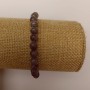Elastic bracelet with tinted quartz (synthetic acrylic), dark gray smooth beads, 6.5 mm diameter, 18 cm length