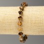 Elastic bracelet with Tiger's Eye bead, faceted bi-cone, bead diameter approx. 8×8 mm, length about 18 cm