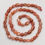 Carnelian beads, faceted on thread, diameter 6x7 mm, length 40 cm