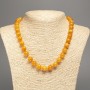 Necklace with smooth 10mm beads, orange-yellow 'Amber' color, 50 cm length, white nephrite (dyed synthetic)