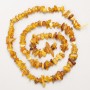 Amber chip beads on thread, diameter 5×2 mm, length 40 cm