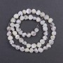 Mother-of-pearl faceted beads, 8x6 mm, 37 cm long on thread