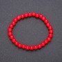 Bracelet made of natural coral pressed on elastic — smooth bead, diameter 6(±)mm, length 18cm