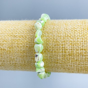 Bracelet with light-green mother-of-pearl, faceted beads, 8x6 mm diameter, length 18 cm (stretch)