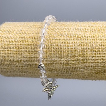 Bracelet with rock crystal smooth beads, 6 mm diameter ±, with silver-tone inserts, length 18 cm (stretch)