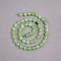 Prehnite beads on a thread, natural stone, faceted ball, diameter 8 mm +/-, length 39 cm +/-