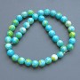 Beads 'Variscite' (acrylic) blue, white, and yellow, smooth 10 mm beads, length approx. 39 cm on a beading thread