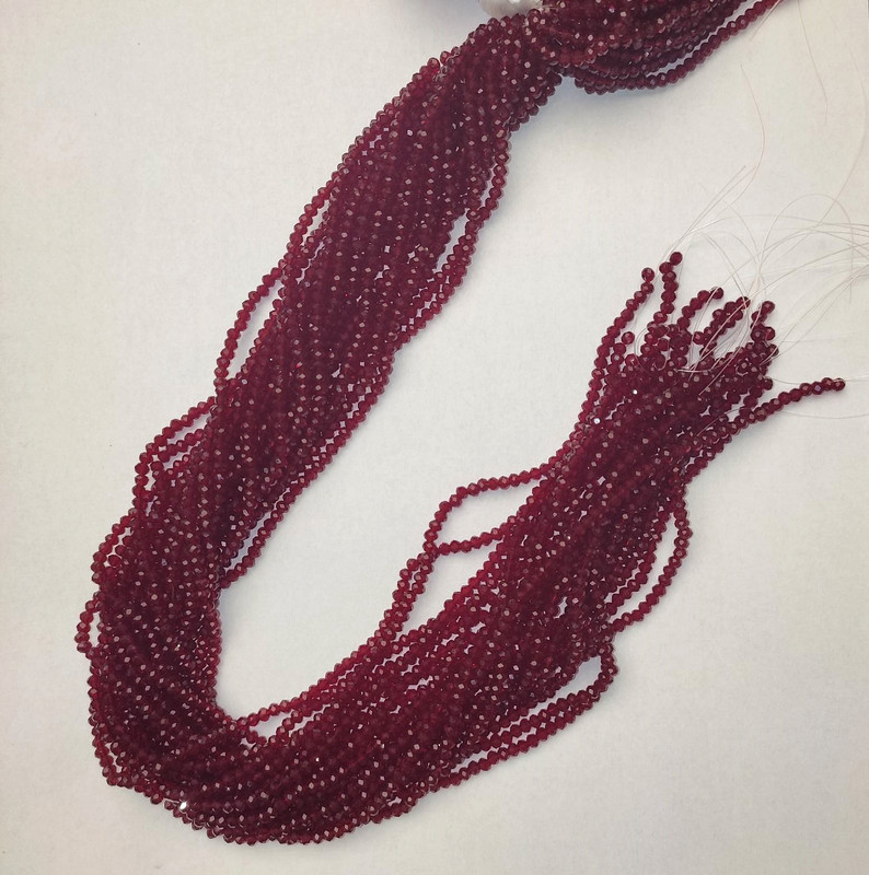 Beads Czech Crystal dark red transparent faceted rondelle, diameter 3x2.5 mm ±, length 38 mm ± on thread