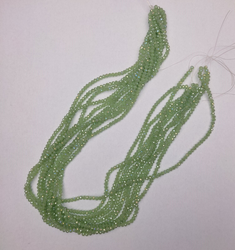 Beads Czech Crystal green with a gasoline tint, faceted rondelle, diameter 3x2.5 mm, length 40 cm +/- on beading thread