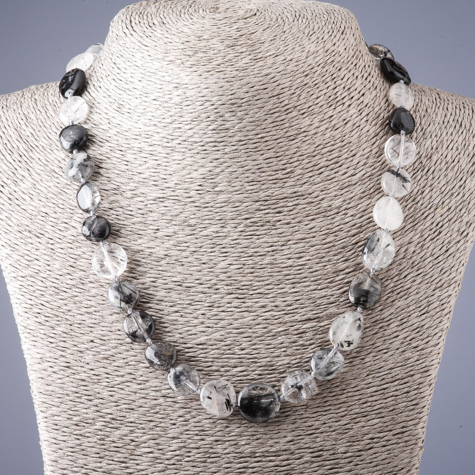 Black rutile quartz necklace with flat faceted beads, 11x14 mm diameter, length approximately 50 cm