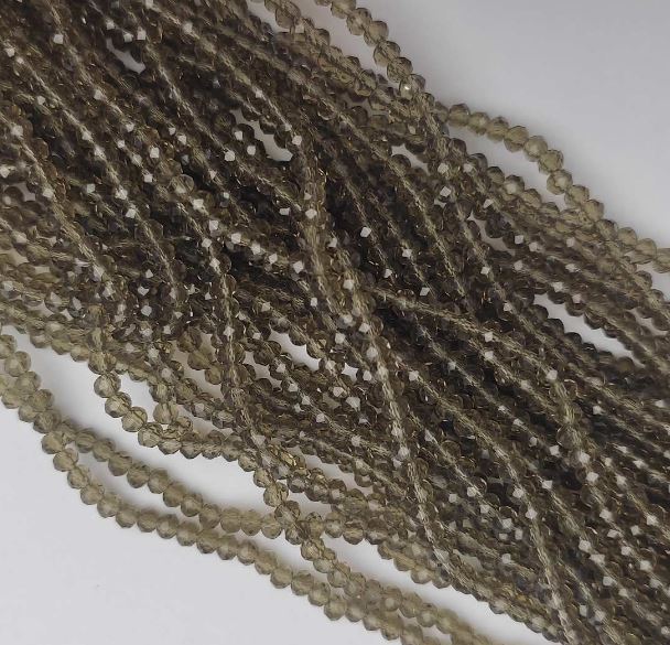 Seed beads Czech crystal transparent champagne 'Rondelle', diameter 3.5x2.5mm, length 38 cm +/- on thread