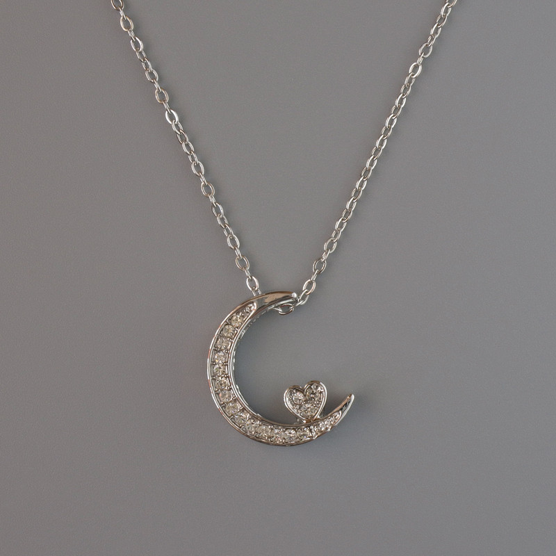 Pendant "Moon" on a chain, silver-toned metal, diameter 18x14 mm, thickness 1 mm + -, length 40-45 cm +