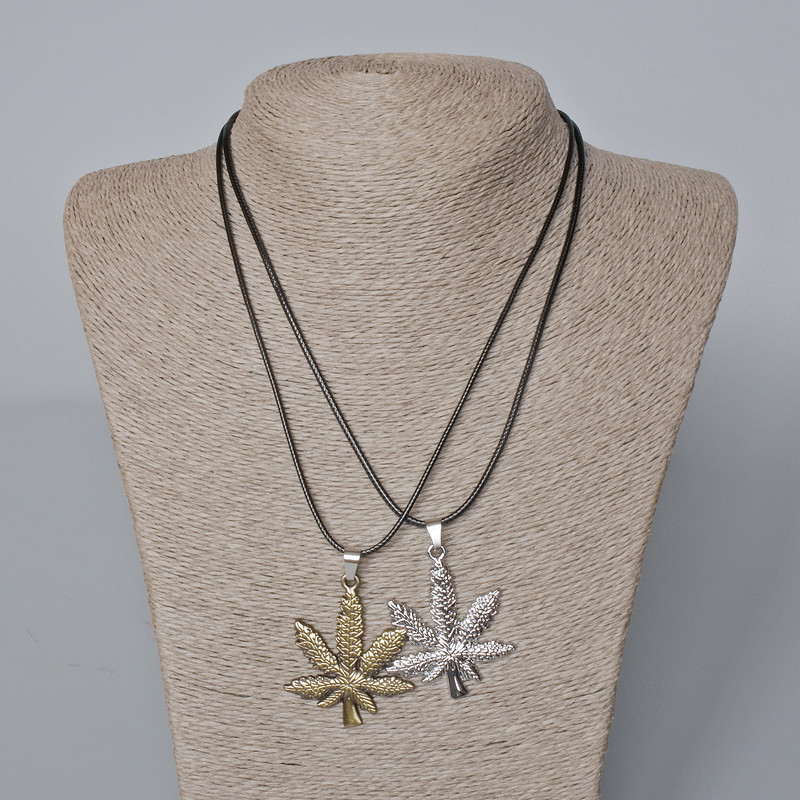 Pair of pendants "Hemp Leaf" bronze and silver-tone metal 44x37 mm, length 45-50 cm