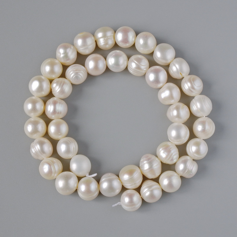 Textured freshwater pearl beads, 11x9 mm, length about 35 cm on thread