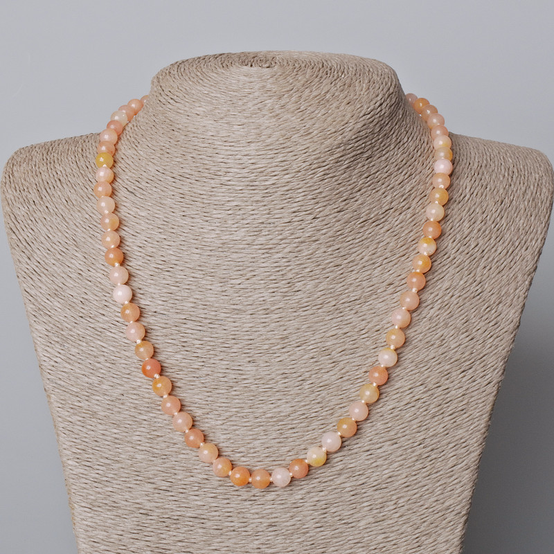 Beaded necklace of tinted quartz, smooth beads, 6.5 mm diameter, length 45–48 cm