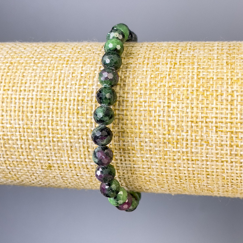 Bracelet with faceted zoisite beads, 6 mm diameter, 18 cm length, stretch