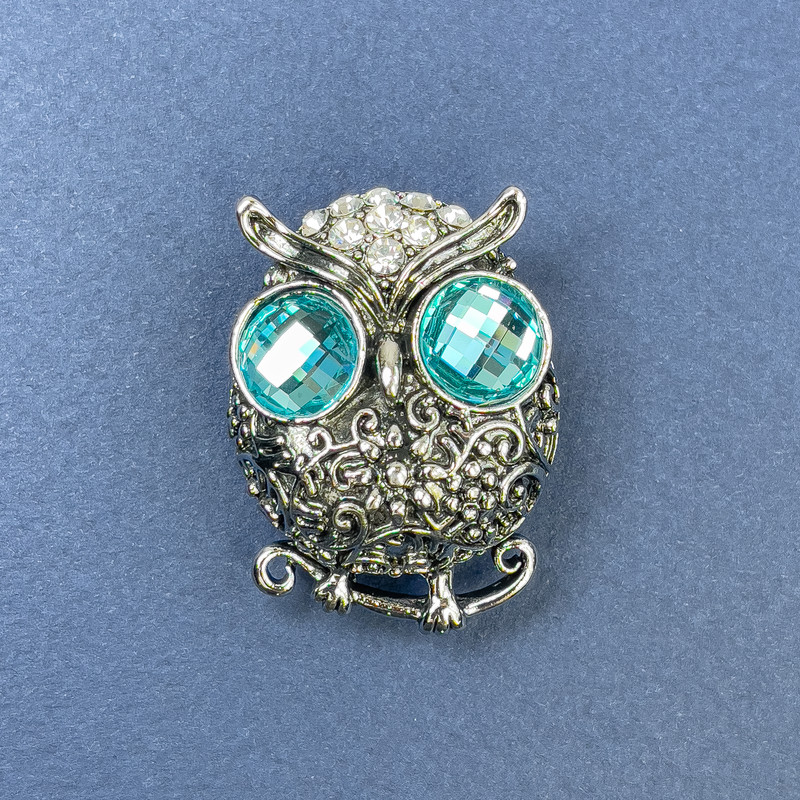 Owl Brooch with blue and white crystals, silver-toned metal, diameter 27 mm, length 38 mm