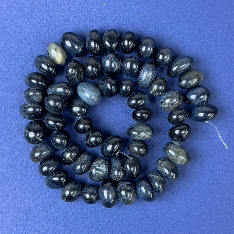 Hawk's Eye Beads, Faceted, 8-13 x 8-10 mm, on beading wire, length 40 cm+