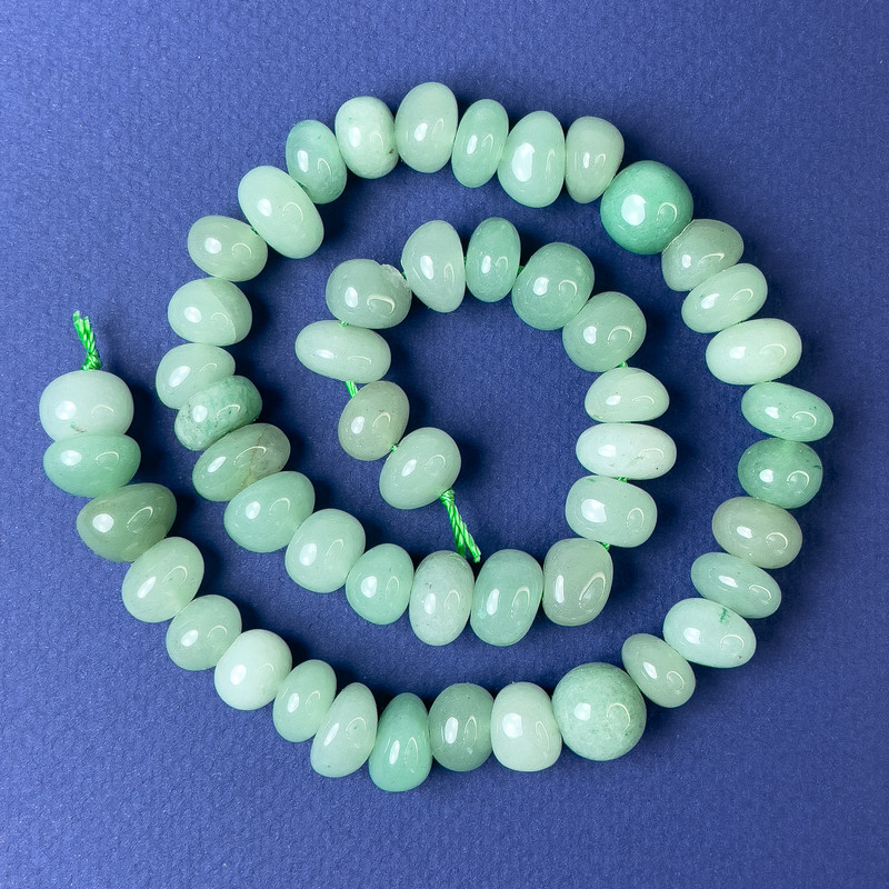 Faceted nephrite beads 10×8 mm on a thread, length 40 cm