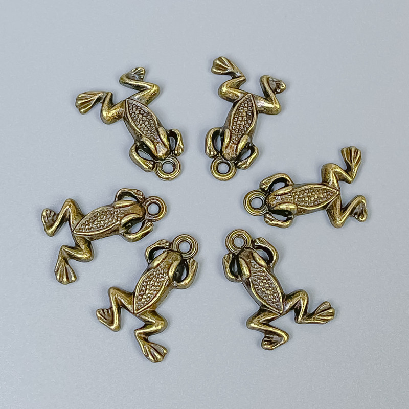 Frog pendant findings, bronze metal color, size 20×13×3 mm ± hole, 1.5 mm diameter ± packaging 20 g (~18 pcs)