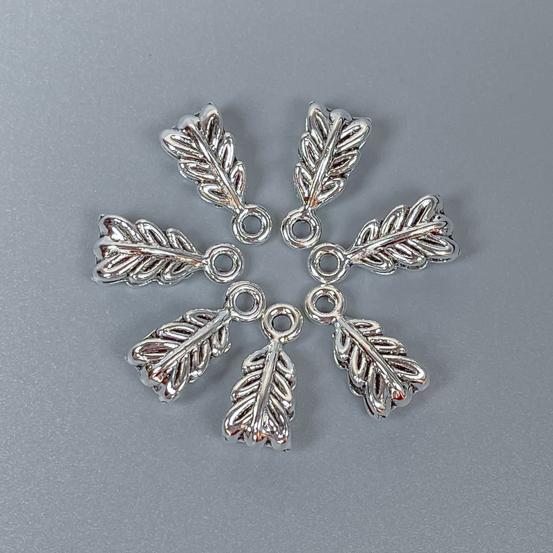 Silver-colored bail, size 14×7×5 mm, holes diameters about 2.5 mm and 1.8 mm, packaging 22 pcs