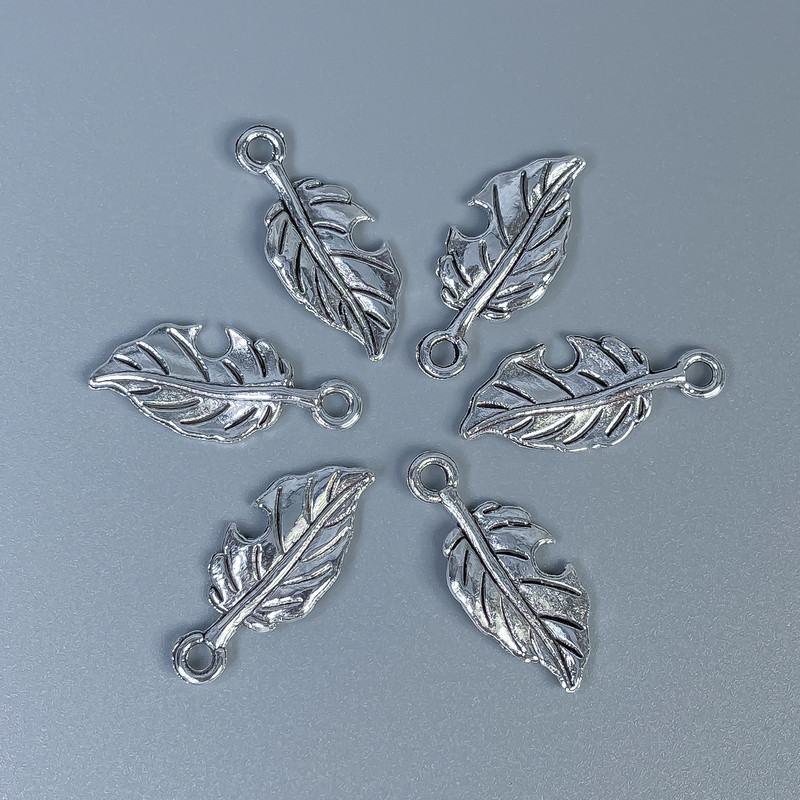 Leaf pendant findings, silver-colored metal, size 23x10x1 mm, hole diameter 2 mm, packaging 20 g (~26 pcs)