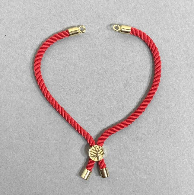 Textile bracelet base, red color with metal insert, diameter 5.5 mm +/-; diameter 8 mm +/- gold-tone metal, length 10.5 cm