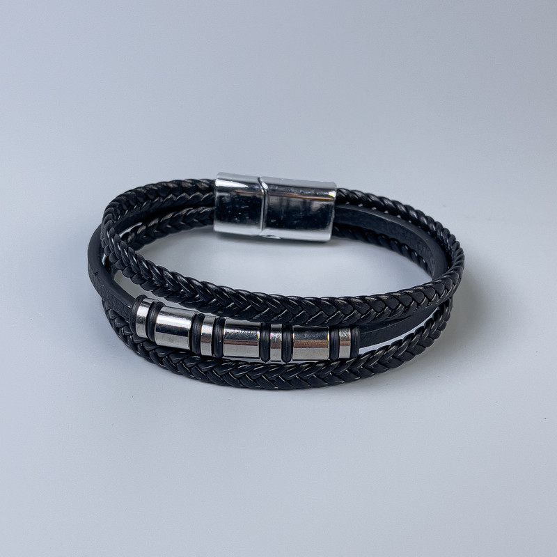 Men's black eco-leather bracelet with metal inserts, thickness 10–18 mm, length 22 cm, silver-tone metal on the clasp