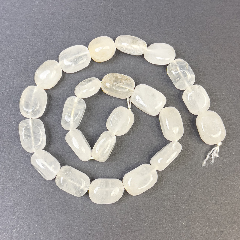 Faceted rock crystal beads 14x11 mm on thread, length 40 cm+