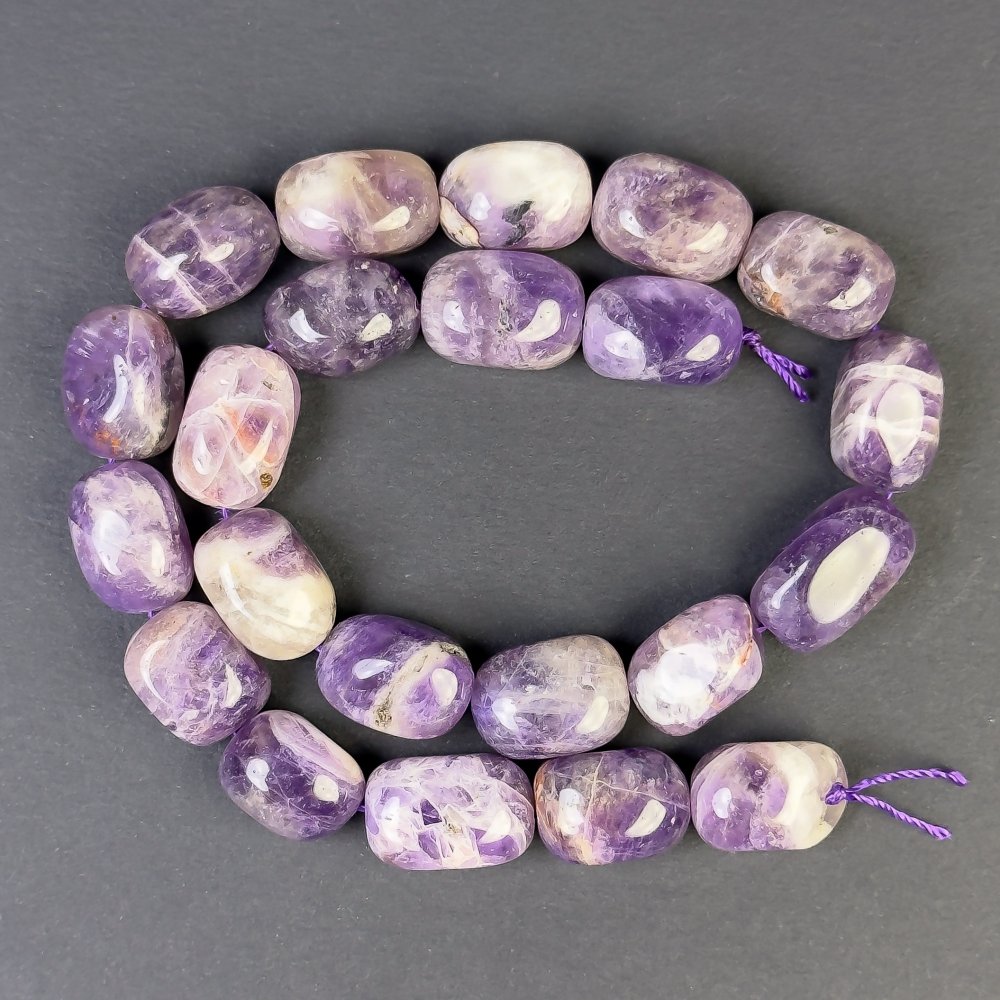 Amethyst faceted beads 18x13 mm on thread, length 39 cm+