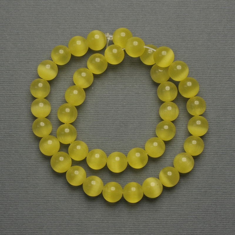 Cat's Eye Beads Yellow (per piece) Smooth Round Bead, 10mm Diameter ± on Monofilament, Length 38 cm+