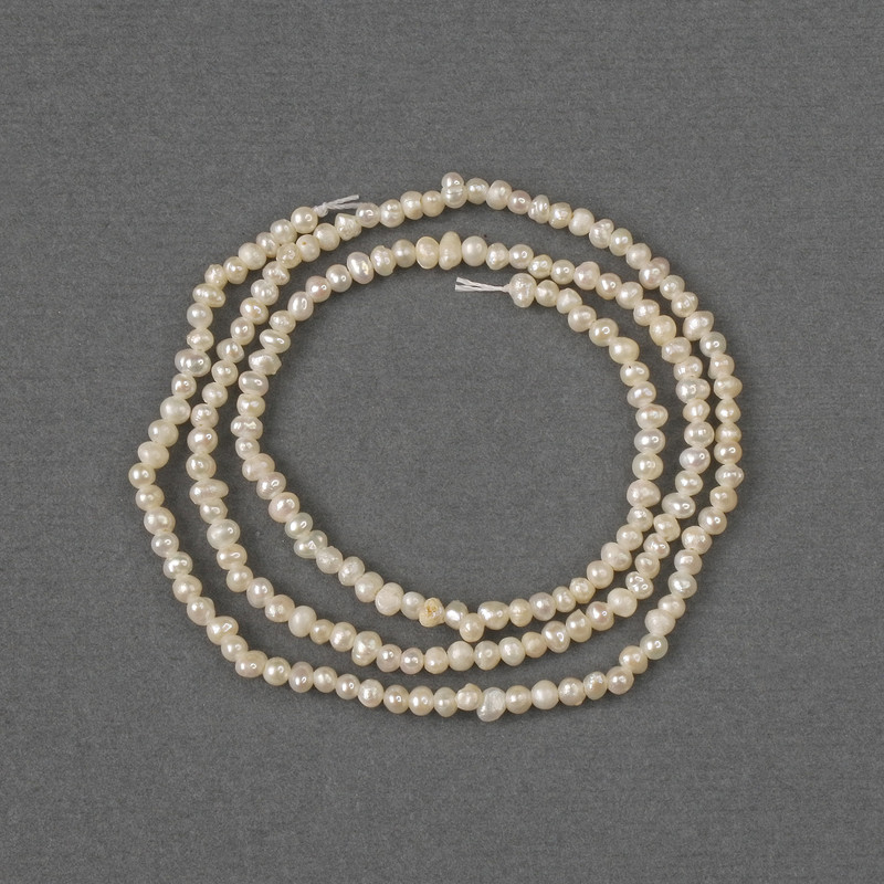 Beads of natural freshwater pearls, 2–2.5×2 mm, length 35 cm on a thread
