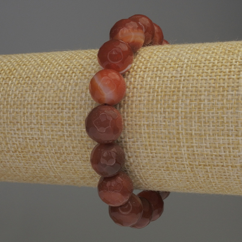 Carnelian bracelet with faceted beads, 12 mm diameter, 18 cm stretch
