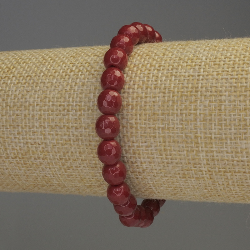 Bracelet with faceted coral beads, 8mm diameter, 18cm stretch