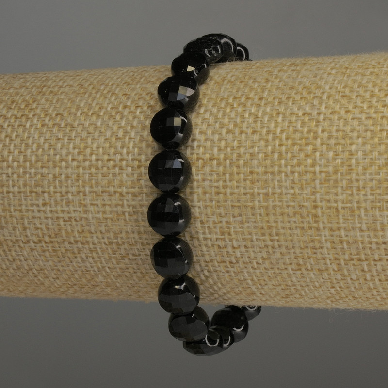 Bracelet with black tourmaline, faceted coins, 8×5 mm diameter, 5 mm ±, 18 cm stretch