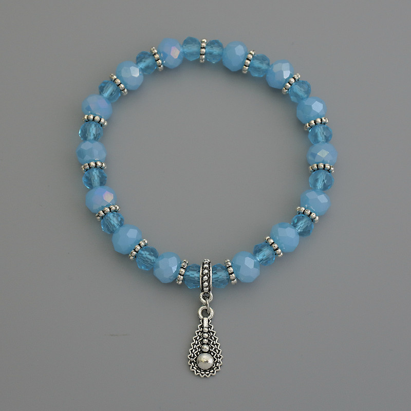 Bracelet with Czech crystal rondelles, diameters 8x6 mm and 6x5 mm, with metal inserts, 18 cm stretch