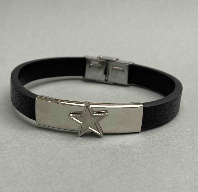 Black bracelet with a clasp and metal inlays, length 21 cm+