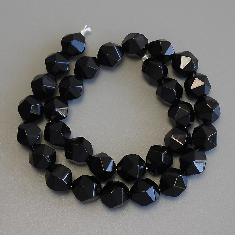 Faceted Black Onyx Beads, diameter 12×10–11 mm, length 36 cm on thread
